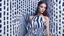 Placeholder: Fashion, gorgeous model, standing in optical illusion, blue and white color palette, fashion photography, high resolution, detailed, depth of field.