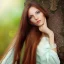 Placeholder: avatar of a beautiful Hungarian woman with clear features with a magical feel with light brown long hair with nature background