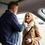 Placeholder: Father say goodbye to his daughter while she is leaving with a suip