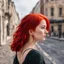 Placeholder: a girl with bright red hair, looking over her shoulder, walking along a bust street