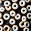 Placeholder: White and black striped donuts on a black table