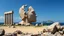 Placeholder: Summary: The image features a surreal landscape with a colossal, partially destroyed statue of a head beside ancient ruins, against a backdrop of a tranquil sea and distant island. Detailed Description: Objects: The scene prominently displays the large, fragmented head of a statue, which conveys the impression of a once-majestic figure, possibly symbolic of a deity. Surrounding it are several ancient pillars, hinting at a classical architecture style. In the foreground, rocky terrain meets the s