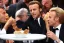 Placeholder: Emanuel Macron and Johny Hallyday are eating chiken with their nose