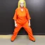 Placeholder: female prisoner, hyper realistic, orange jumpsuit, blonde hair