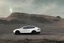 Placeholder: A Tesla 'Model Y' is drifting at high speeds, at the lunar landing site of the 'Apollo 11'. (CINEMATIC, WIDE ANGLE LENS, PHOTO REAL)