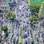 Placeholder: busy street crossing from straight above