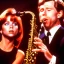 Placeholder: REd-haired Ron howard Is richie from happy days playing A saxophone with his "eyes closed", rock band, embouchure, joanie cunningham