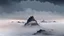 Placeholder: looking up at misty foreground and night sky background, no sun, single sharp narrow mountain peak coming through the mist in the center