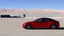 Placeholder: A Tesla's 'Model S Plaid' is racing at top speed, across the 'Area 51' facility in the USA. CINEMATIC. WIDE ANGLE LENS.