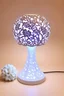 Placeholder: Create a product table lamp inspired by nyonya kebaya in wood material process laser cutting in off white background