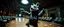 Placeholder: pin hole cam, knitted fluffy mean wolf alien gremlin badger star ship bridge captain dancing in a big hall in the style of Rembrandt and Escher and Dali