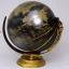 Placeholder: fantasy world globe, black marble, pearl inlay, fine gold detail, marginalia