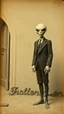 Placeholder: An old picture style of white and brown and very bad quality old camera with cracks of hitler standing with an Alien who is wearing a suit, the year 1900