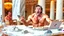 Placeholder: angry guy on phone at topless table next to marble tabletop