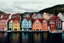 Placeholder: Colored pencil drawing, Very detailed, Realistic, Drawing of the colorfull houses in the city Bergen in Norway. Colorfull, professional, detailed, pencil strokes