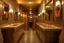 Placeholder: Pictures of a group of bathrooms in Mathaf Restaurant. The walls and floors are in brown tones, and the sinks are on one wall.