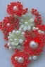 Placeholder: Red flowers and in the middle beautiful pearl beads 2