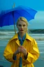 Placeholder: In the music video, a 23-year-old woman with blonde hair and bright blue eyes stands in the sea, dressed in a yellow fisherman's jacket. She holds an umbrella, but it offers no protection from the pouring rain. Around her, seahorses are moving. The rain is pouring heavily. She is standing in the middle of the sea. You can see here completely. The rain is pouring really really hard. horses