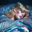 Placeholder: Taylor Swift sleeping in holographic foil