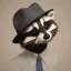 Placeholder: raccoon with a fedora