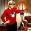 Placeholder: Movie poster for 'A Christmas Story', blonde Ralphie wearing an ugly red Christmas sweater and thick lens glasses looking at a lamp with a lamp stem shaped like a woman's leg in a fishnet stocking, humorous, nostalgic, 1950's aesthetic, background is a living room