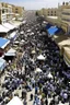 Placeholder: People crowd the weekly market in the Libyan capital, Tripoli