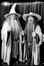 Placeholder: Gandalf and Frodo taking serie of BW photos inside photo booth.
