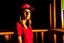 Placeholder: woman with a red baseball hat. leaning on a wooden balcony.night time. studio lightining.