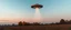 Placeholder: flying saucer ufo in autumn evening field shooting a cone of light upwards to the sky