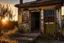 Placeholder: abandonaded house, near little road, break windows, wooden door, graffiti on facade, sunset