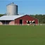 Placeholder: a modern Dairy barn in front of concrete dairy siloes, grass bottom front with a Holstein cow(1).