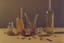 Placeholder: A still life with glass bottles and a glass vase in sand dunes by Giorgio Morandi