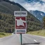 Placeholder: Road sign at the border between Austria and Australia