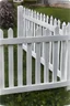 Placeholder: white fence in yard, photograph