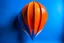 Placeholder: paper cut simple balloon spaceship whit 4 paper orange and blue like photography