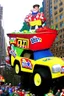 Placeholder: macy's day parade float of Bill Newton from hill climb racing the game