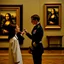 Placeholder: Mona Lisa comes out of the picture and kisses a young navy officer who is standing in the museum looking at her picture