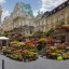 Placeholder: Flower store in the foreground of street in Vienna Austria