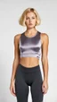 Placeholder: photography of a beautiful anorexic woman, grey satin triathlon top, sports illustrated, blond short wavy bob haircut, pronounced sternum, flat chest, anthracite cycling leggins