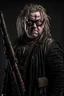 Placeholder: Mad-eye Moody with a chainsaw for a right arm wearing leather armor, looking gaunt and angry