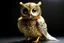 Placeholder: owl sculpture made of gold wire, real pearls, driftood and cotton balls