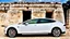 Placeholder: A Tesla's 'Model S Plaid' is parked, at Chichen Itza, in Mexico. CINEMATIC. WIDE ANGLE LENS. CINEMATIC. WIDE ANGLE LENS.