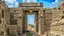 Placeholder: An ancient Phoenician city with a large gate , down view