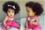 Placeholder: a beatiful little baby girl, 9 months, moana style, curly hair, mixed race