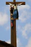 Placeholder: on top of the crucified Jesus is a huge stork's nest with storks