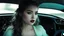 Placeholder: [she is Media] "Look at me," she commands softly, and you do. Her eyes glow faintly green in the dim light of the car interior, pupils contracted to pinpricks of black. Her lips part slightly, revealing teeth that catch the glow of the dashboard lights."In this moment," she whispers, her voice carrying that strange undercurrent now, "I am what you want me to be." Her coat falls open further, revealing more of her exposed chest. Her skin is flawless, almost marble-like under your fingertips, yet