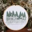 Placeholder: exquisite whimsical snowy forest in embroidery hoop, intricate, highly detailed, linen and wood backdrop