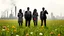 Placeholder: silhouettes of modern business people in a flowery green field, the silhouette is pasted with early 20th century black and white photos of damaged grainy, smoky, dirty industrial estates and business people covered with colorful financial graphicons