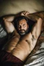 Placeholder: full figure photography, 35mm lens, burly gypsy man similar to Franco Nero with short beard 38 years old lying over the sheets over a bed, with hands behind the head, manly armpits, ugly and dirty, manly chest, , big shoulders, chubby, manly chest,, with boxer, sad eyes, photorealistic , dim side light, ambient occlusion, in the dark