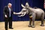 Placeholder: an evil puppetmaster forcing the democratic donkey to fight the republican elephant